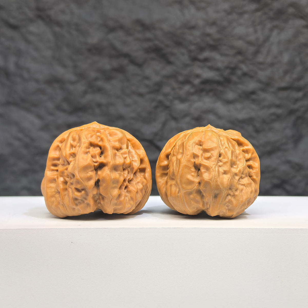 Pair of Toad Head Wenwan Walnuts from Wenwan Art, 37mm x 35mm, featuring detailed natural walnut carvings.