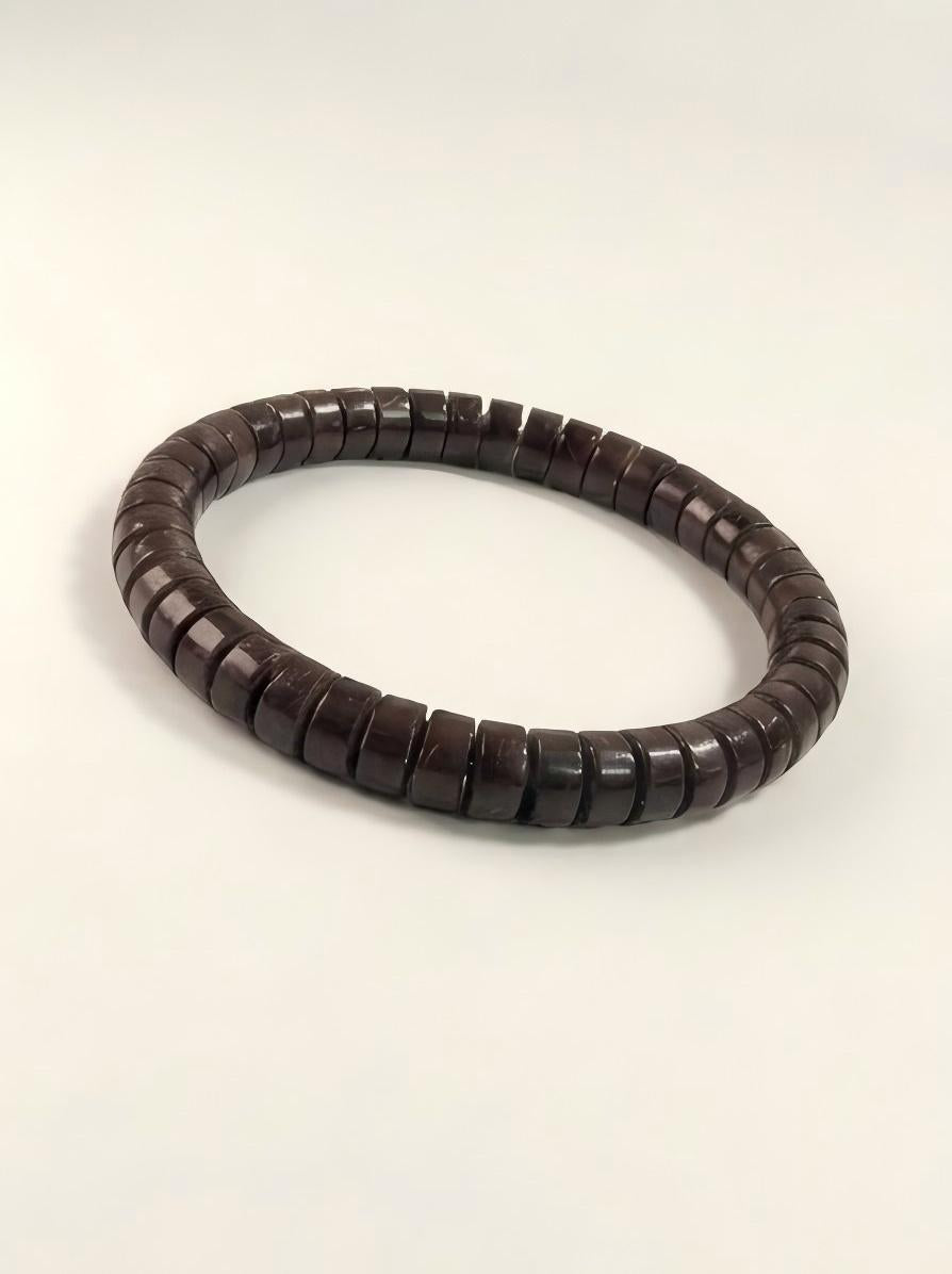 Natural coconut shell bracelet with straight-cut 7mm beads by ZenWenwan, featuring a rustic, earthy design.