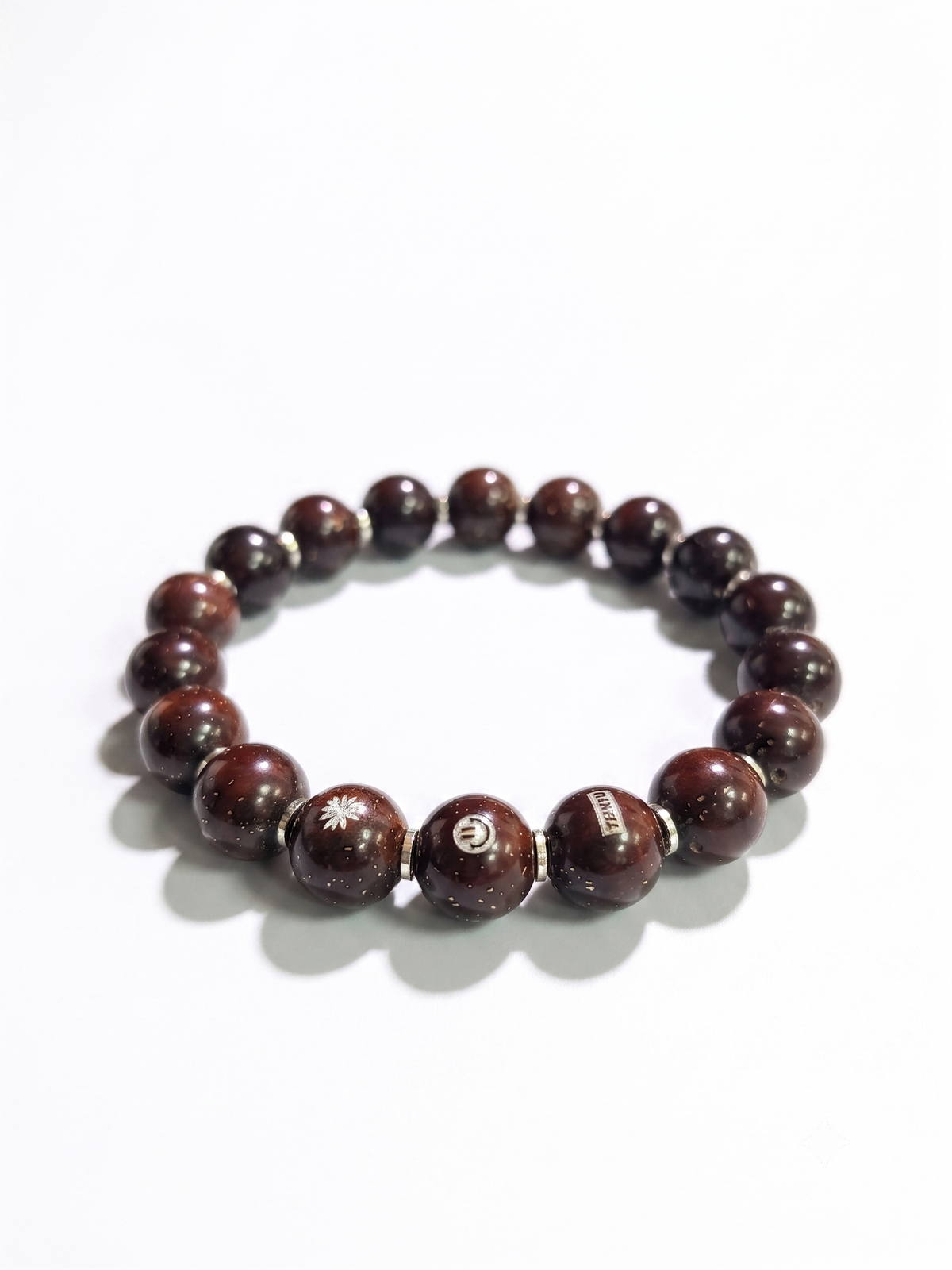 ZenWenwan Fortune Seed (Zi Jin Shu) barrel bracelet with 12mm beads and sterling silver spacers, featuring traditional Chinese design.