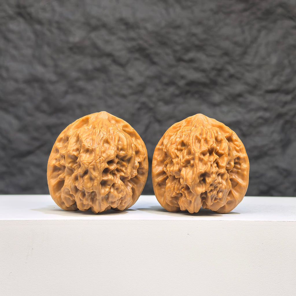 Wild Wolf Wenwan Walnut pair by Wenwan Art, authentic wild walnuts with 33mm x 36mm size, natural wood grain and unique patterns.
