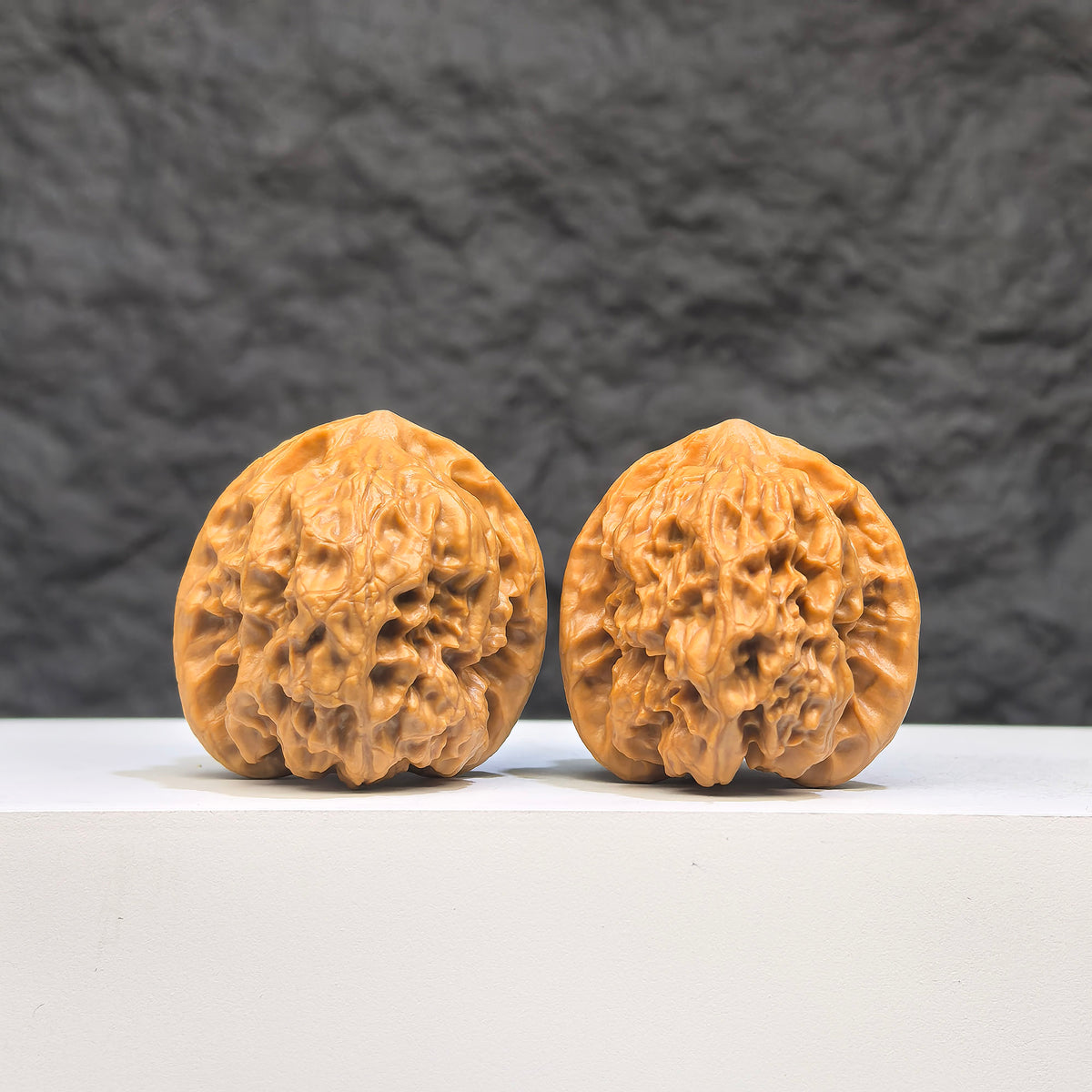 Wild Wolf Wenwan Walnut pair by Wenwan Art, authentic wild walnuts with 33mm x 36mm size, natural wood grain and unique patterns.