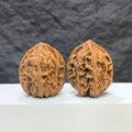 Pair of Beijing Chicken Heart Wenwan walnuts by Wenwan Art, featuring 41mm x 40mm classic walnut specimens.