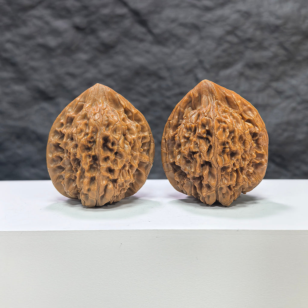 Pair of official Wenwan Walnuts from Wenwan Art, featuring classic design and 40mm x 38mm size, showcasing detailed craftsmanship.