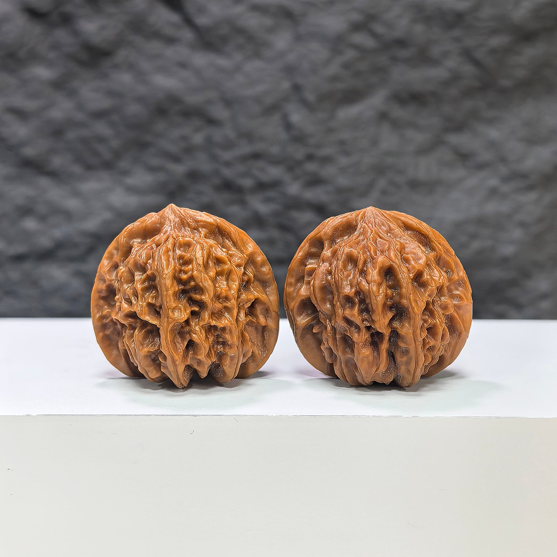 Wenwan Art Pocket Sizuolou miniature Wenwan walnuts pair, 33mm, detailed carved walnut art, traditional Chinese craftsmanship.