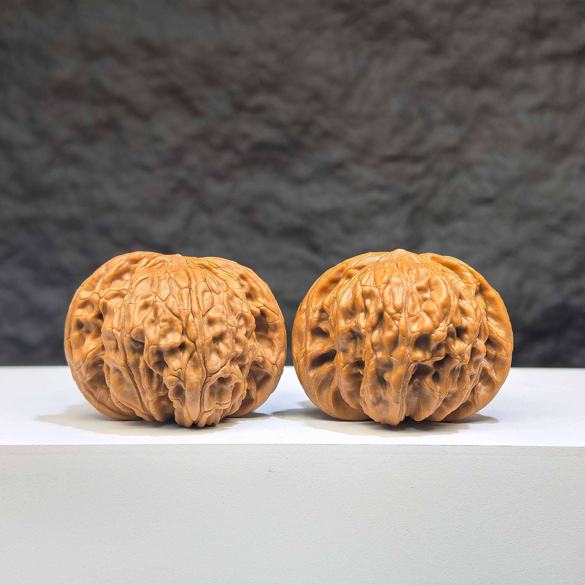Pair of authentic Wild Wenwan Walnuts from Wenwan Art, 39mm x 37mm, featuring natural textures and rich walnut tones.