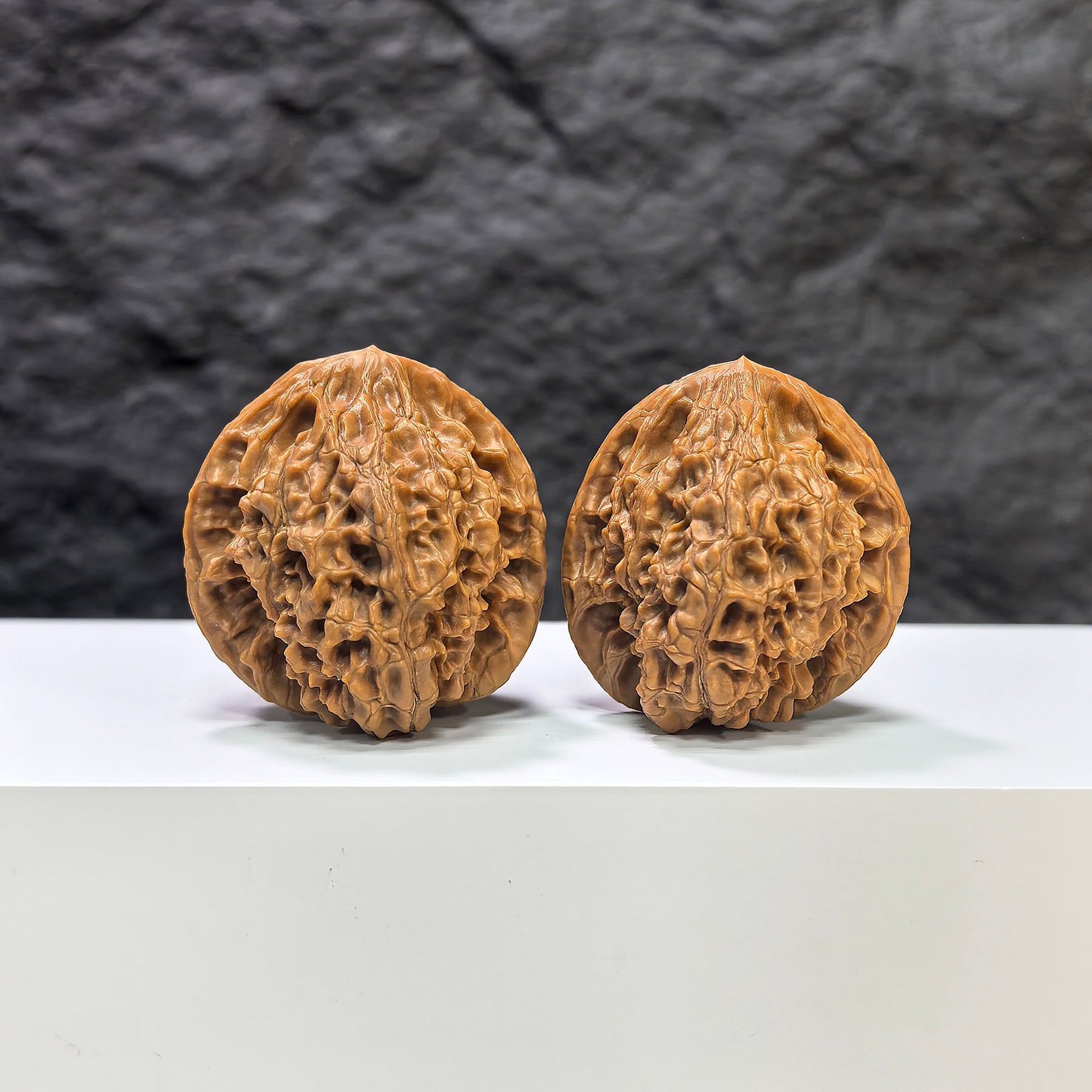 Pair of Golden Kylin Wenwan Walnut carvings by Wenwan Art, 37mm, featuring detailed golden kylin motifs on smooth walnut surfaces.