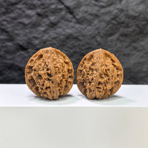 Pair of Golden Kylin Wenwan Walnut carvings by Wenwan Art, 37mm, featuring detailed golden kylin motifs on smooth walnut surfaces.