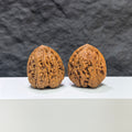 Pair of Pinggu Concave Base Wenwan walnuts from Wenwan Art, deep-base walnut pair with 33.0mm x 37.0mm dimensions.