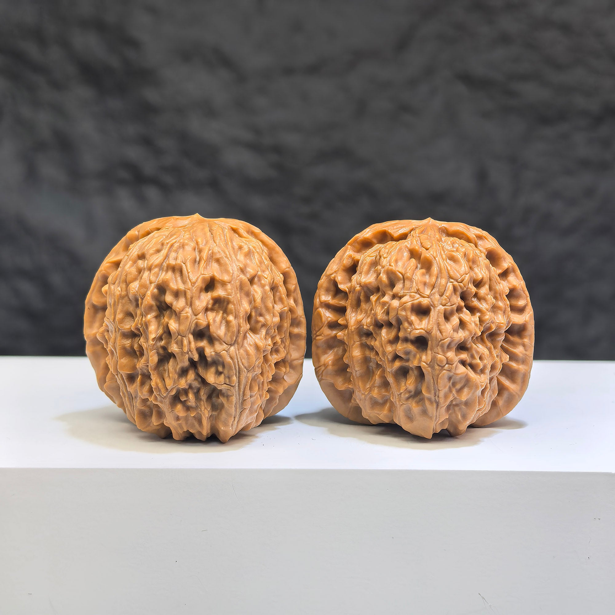 Pair of White Lion Wenwan Walnuts by Wenwan Art, 36mm classic Chinese collectible walnut carvings, detailed white lion designs.
