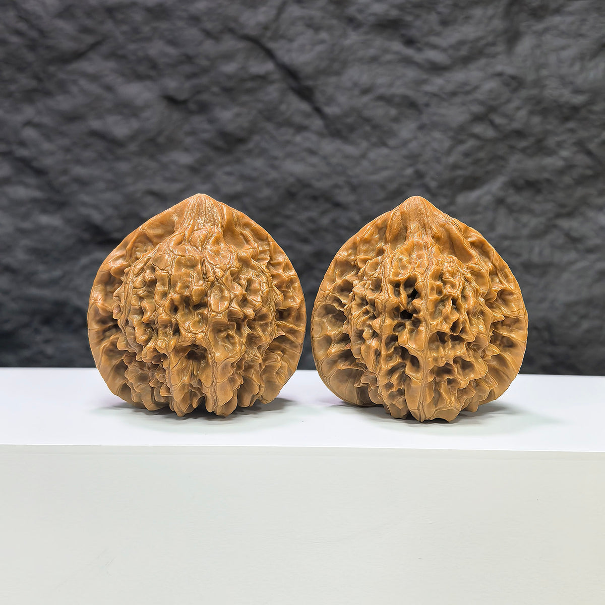 Official Wenwan Art classic walnut pair with 44mm and 42mm size, featuring detailed, natural wood grain and smooth polished surfaces.