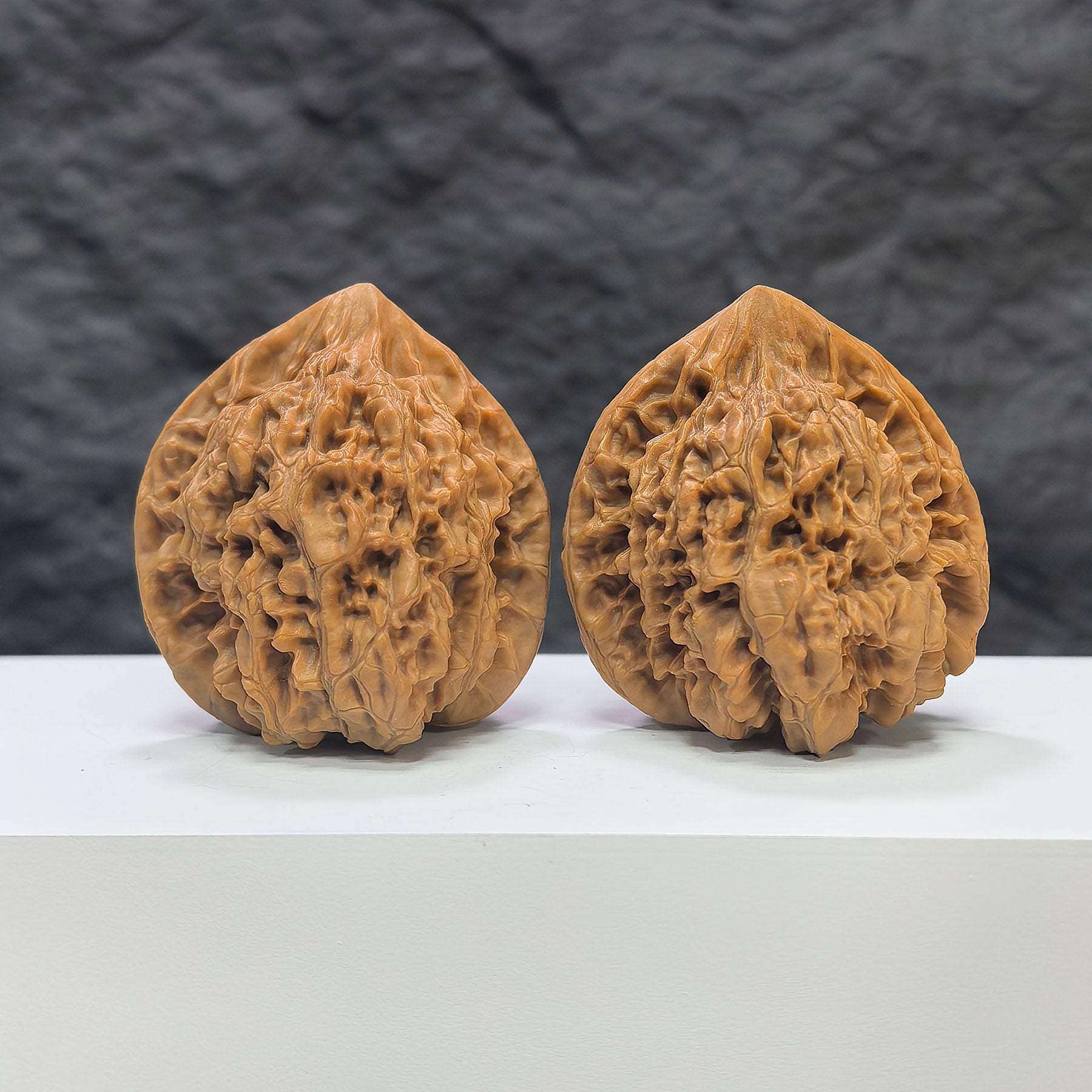Official Wenwan Art hat-shaped walnut pair, classic 44mm x 40mm Wenwan Walnuts with detailed carved design.
