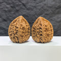 Pair of Beijing Chicken Heart Wenwan walnuts from Wenwan Art, 41mm x 40mm, showcasing smooth, polished walnut carvings.