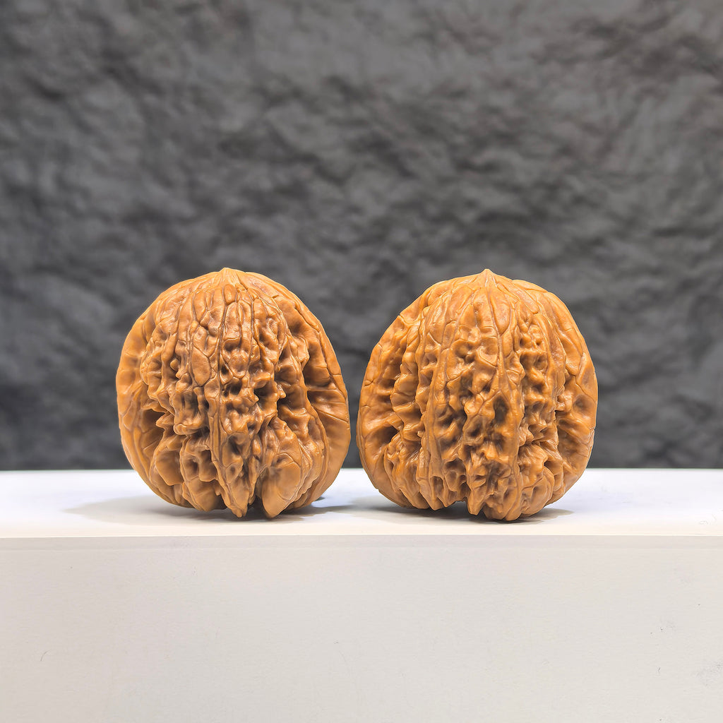Selected grade Blizzard Wenwan Walnut, 3.4cm, from Wenwan Art, showcasing smooth, polished surface and natural wood grain details.