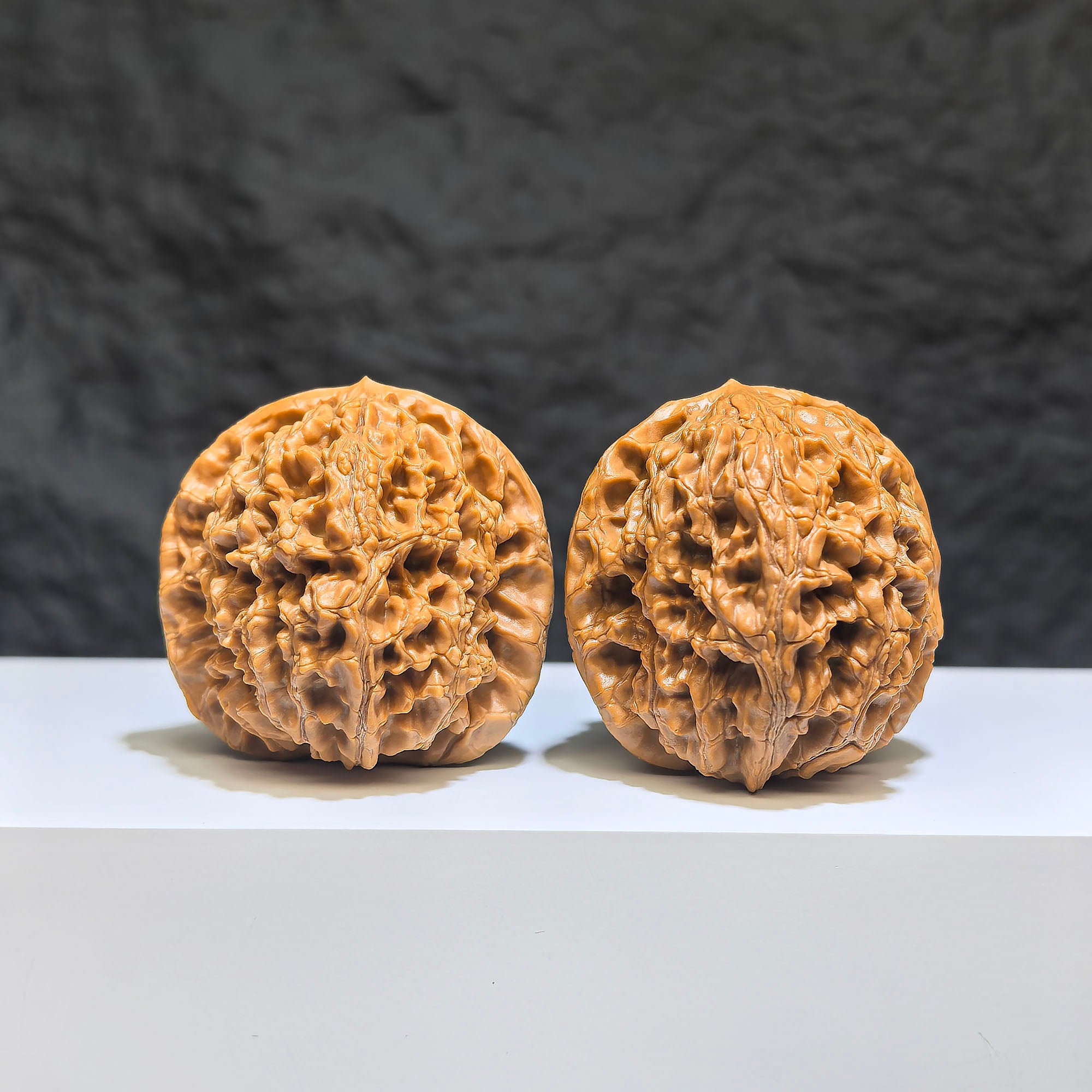 Hand-matched Wenwan Scholar Walnut pair with 球形水龍紋 pattern, 40mm size, crafted by Wenwan Art, featuring intricate natural wood grain.