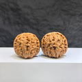Miniature Wenwan Walnut pair featuring white lion design by Wenwan Art, measuring 32x34mm, in detailed craftsmanship.