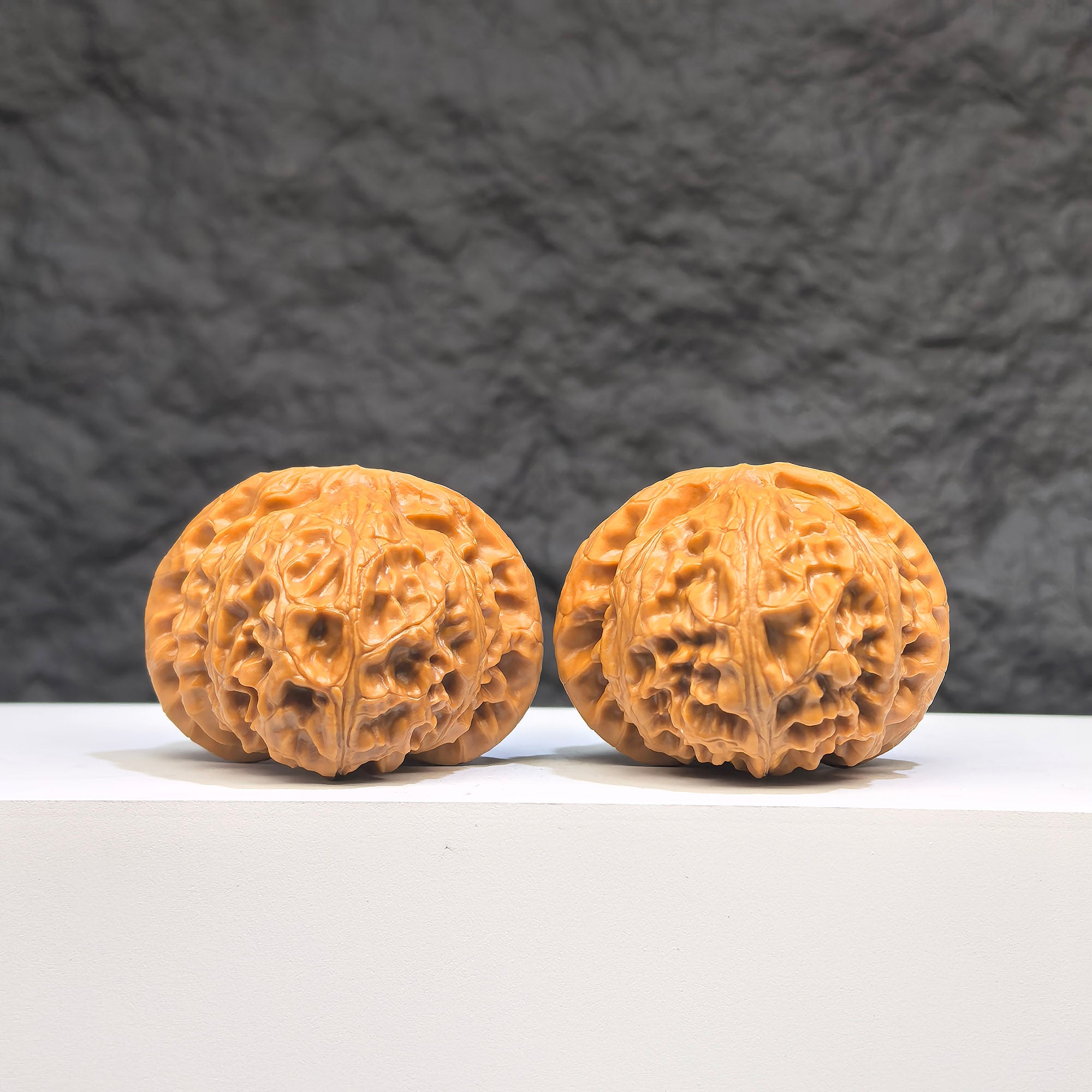 Pair of Palace Lantern Wenwan walnuts from Wenwan Art, featuring carved traditional designs, 42mm x 41mm, detailed and polished.