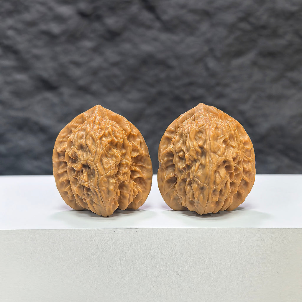 Pair of miniature Wenwan walnuts from Wenwan Art, 32mm size, featuring detailed carved walnut shells on a neutral background.