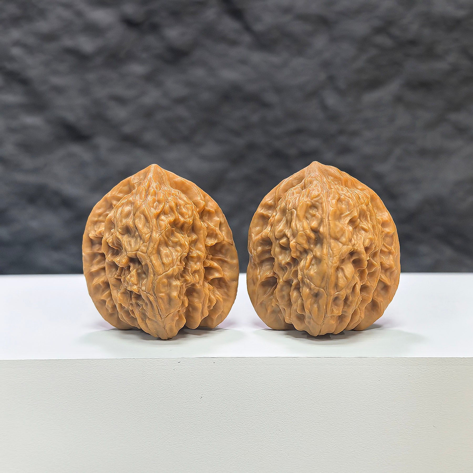 Pair of miniature Wenwan walnuts from Wenwan Art, 32mm size, featuring detailed carved walnut shells on a neutral background.