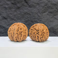 Selected grade Sizuolou Wenwan walnut, 4.1×3.7cm, showcasing smooth, polished surface and natural wood grain details.