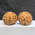 Pair of spherical Wenwan walnuts made from Nanjiangstone, round profile, 41-43mm, crafted by Wenwan Art.