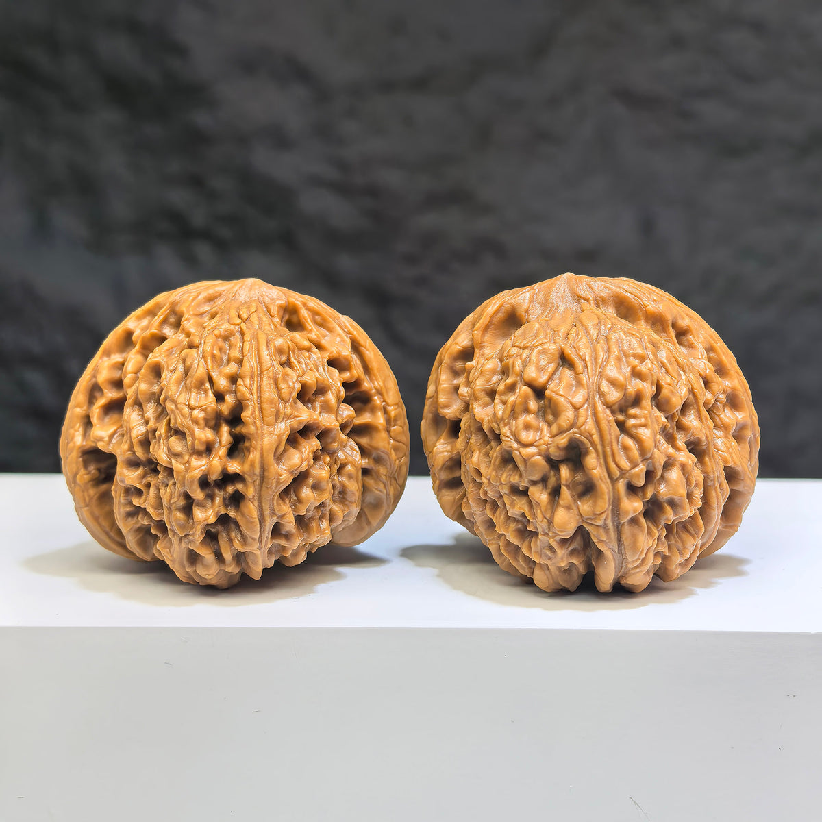 Pair of spherical Wenwan walnuts made from Nanjiangstone, round profile, 41-43mm, crafted by Wenwan Art.