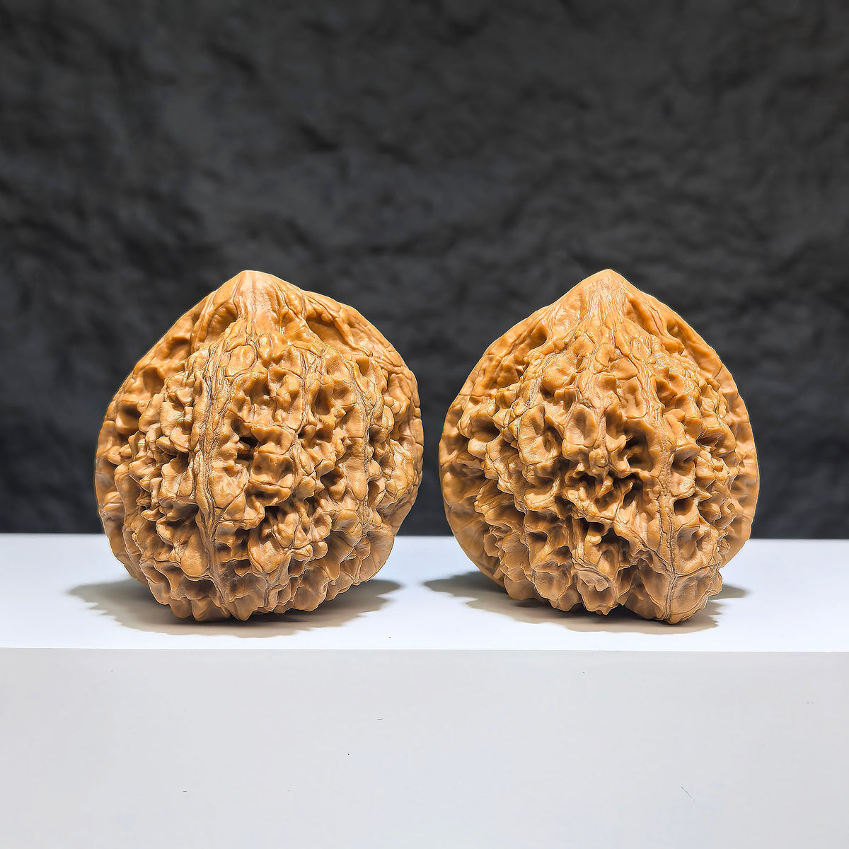 Large Wenwan Walnut pair from Wenwan Art, official premium Big Wenwan Walnuts, 49mm x 46mm, showcasing detailed natural wood grain.