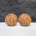 Wenwan Art Sizuolou Classic Wenwan Walnut pair, 41mm x 42mm, showcasing smooth, polished walnut carvings with intricate details.