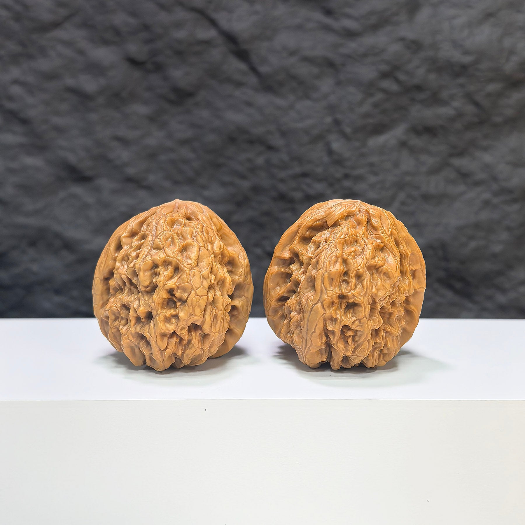 Pair of Wenwan Art Rolling Donkey Walnuts, 40mm classic Wenwan walnuts with detailed carvings, traditional Chinese collectible art pieces.