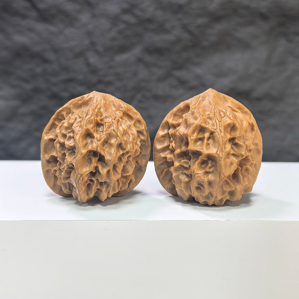 Pair of Pocket White Snake Valley Wenwan walnuts, miniature 36mm x 36mm, from Wenwan Art, showcasing smooth, polished walnut carvings.