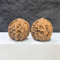 Pair of Pocket White Snake Valley Wenwan walnuts, miniature 36mm x 36mm, from Wenwan Art, showcasing smooth, polished walnut carvings.