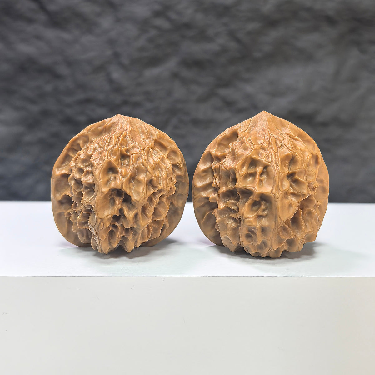 Pair of Pocket White Snake Valley Wenwan walnuts, miniature 36mm x 36mm, from Wenwan Art, showcasing smooth, polished walnut carvings.