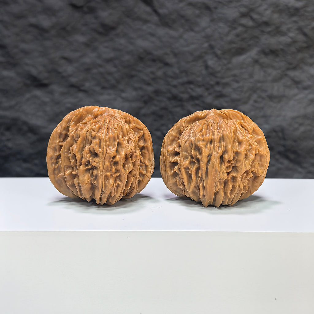 Selected grade Wenwan Walnut from Wenwan Art, four-seat Sizuolou walnut with 4.2×3.8cm size, smooth and polished natural finish.