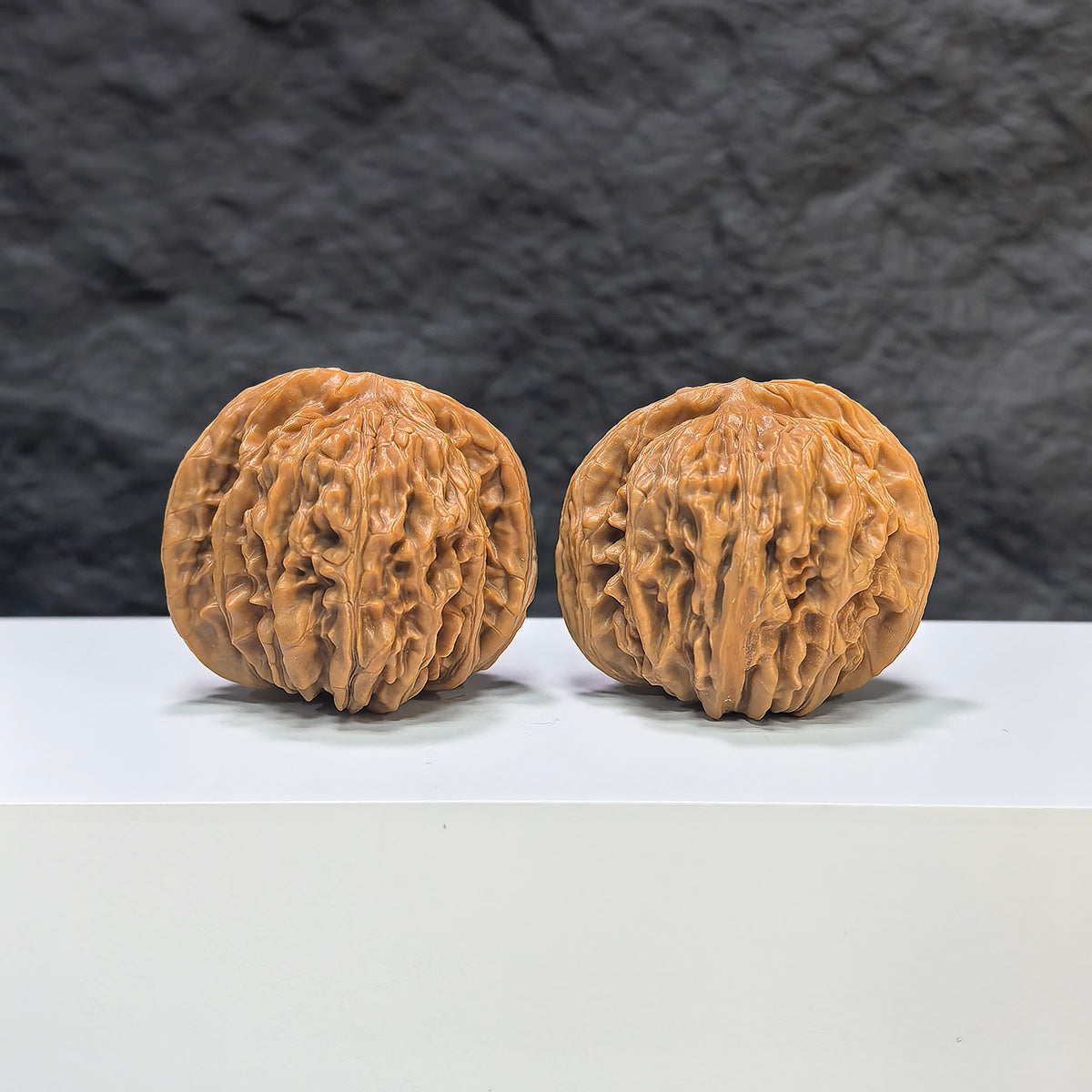 Selected grade Wenwan Walnut from Wenwan Art, four-seat Sizuolou walnut with 4.2×3.8cm size, smooth and polished natural finish.