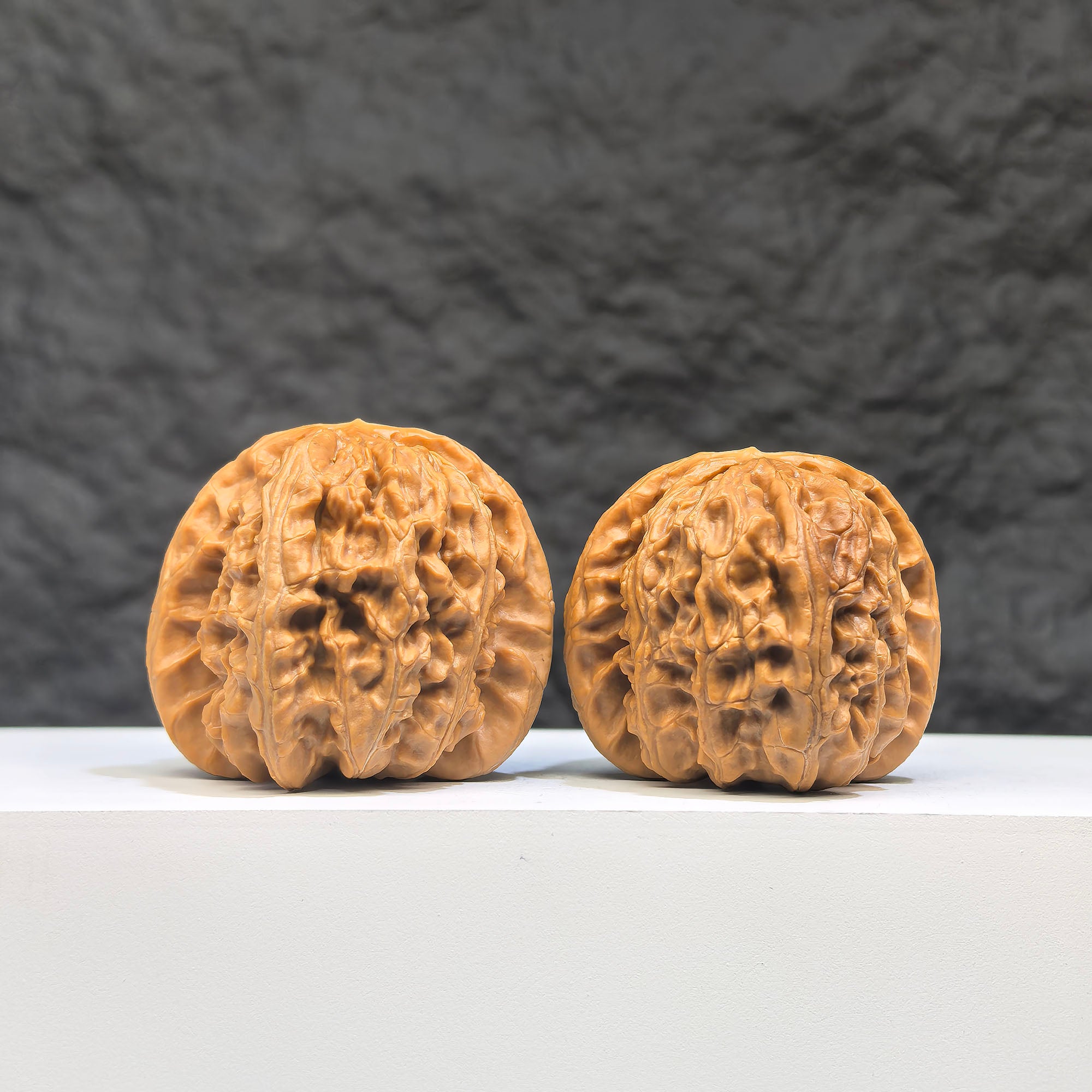 Pair of spherical white lion Wenwan walnuts from Wenwan Art, round-profile, 41mm size, with detailed white lion carvings.