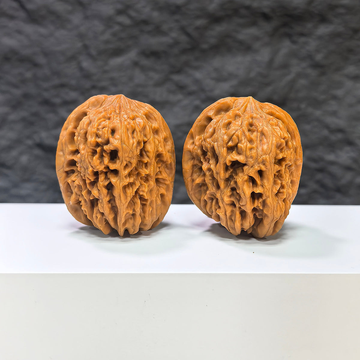 Pair of Pinggu Golden Hammer Wenwan walnuts from Wenwan Art, 39mm x 41mm, showcasing the classic golden walnut craftsmanship.