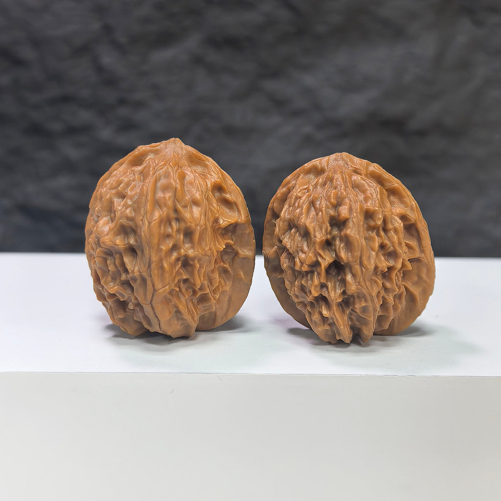 Miniature Wenwan Walnut pair with phoenix tail design, crafted by Wenwan Art, measuring 30x31mm, featuring detailed natural wood grain.