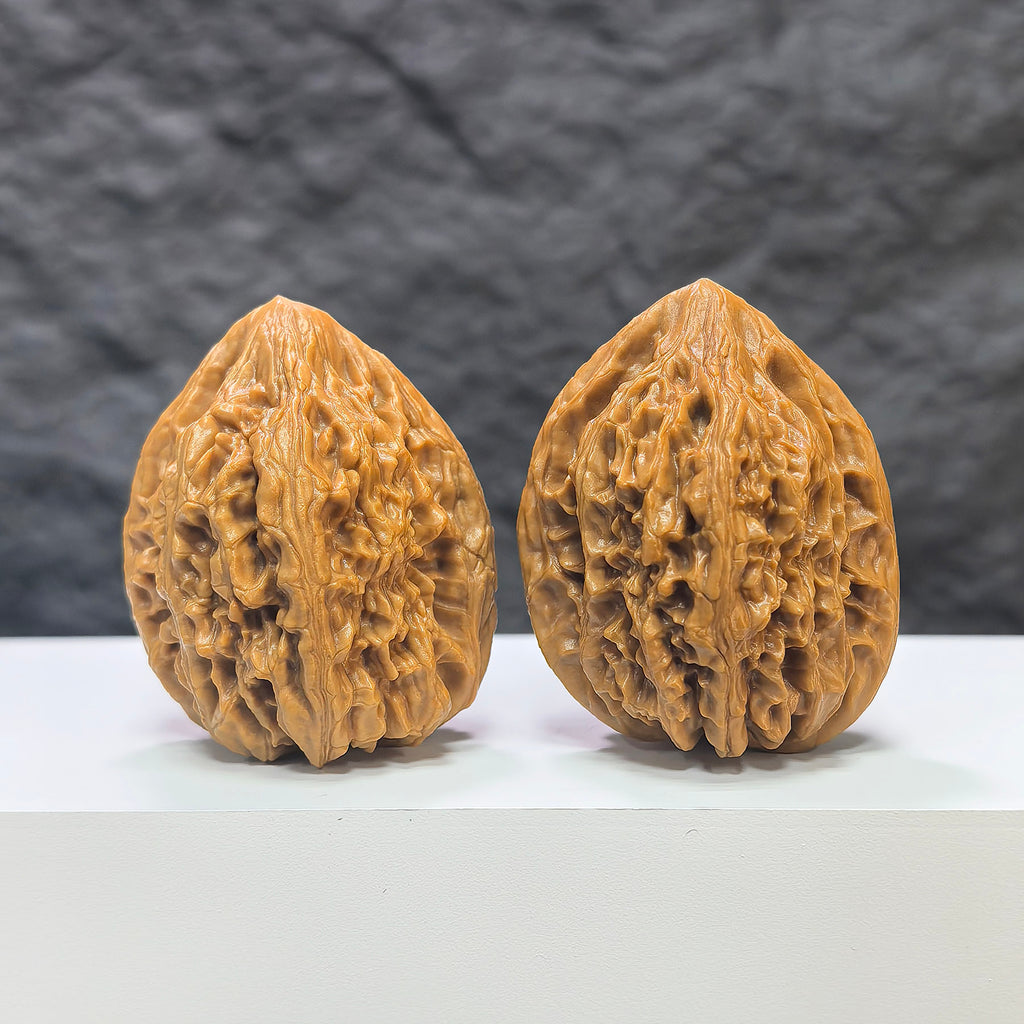 Pair of Beijing Chicken Heart Wenwan walnuts from Wenwan Art, 39mm, featuring detailed natural walnut textures and smooth surfaces.