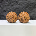 Golden Kylin Classic Wenwan Walnut pair by Wenwan Art, showing two polished walnut carvings with intricate golden Kylin designs.