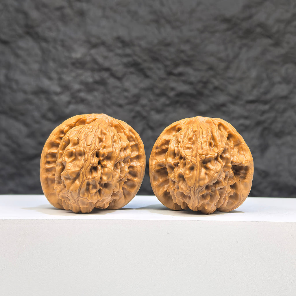 Authentic Wild Wenwan Walnut pair from Wenwan Art, featuring natural wood grain and 38mm x 40mm size in a rustic finish.