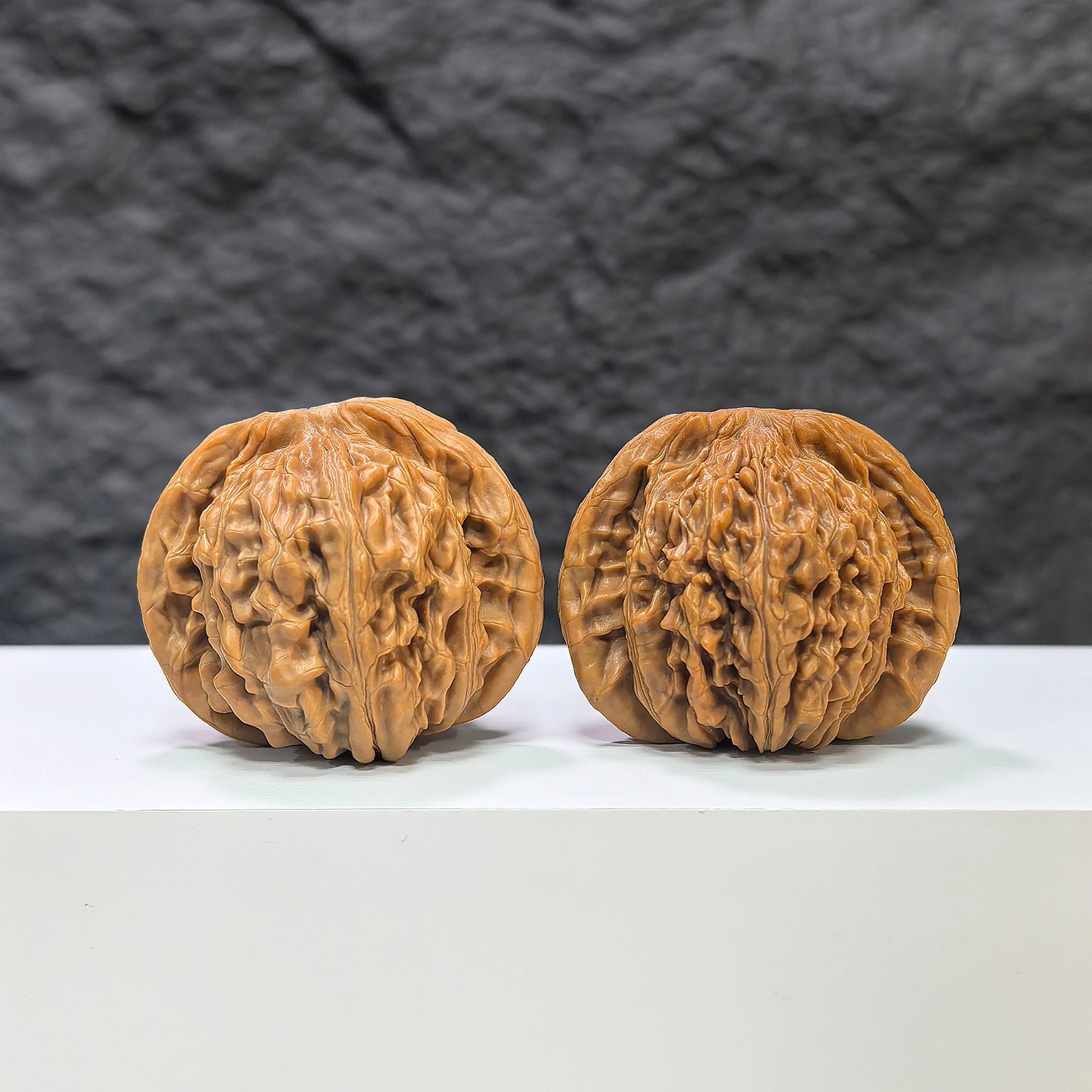 Pair of Sizuolou Classic Wenwan Walnuts from Wenwan Art, 41mm x 39mm, featuring natural walnut textures and smooth polished surfaces.