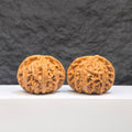 Pair of Palace Lantern Wenwan walnuts by Wenwan Art, 44mm x 38mm, showcasing intricate patterns and natural walnut texture.