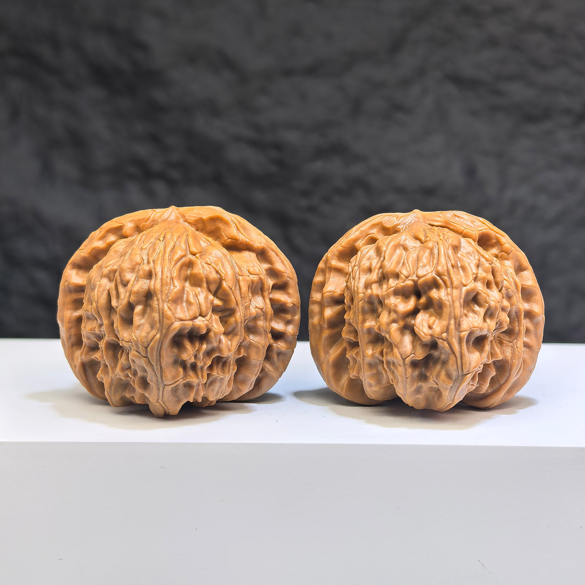 White Lion Wenwan Walnuts pair by Wenwan Art, classic 41mm walnut carvings with detailed white lion designs.
