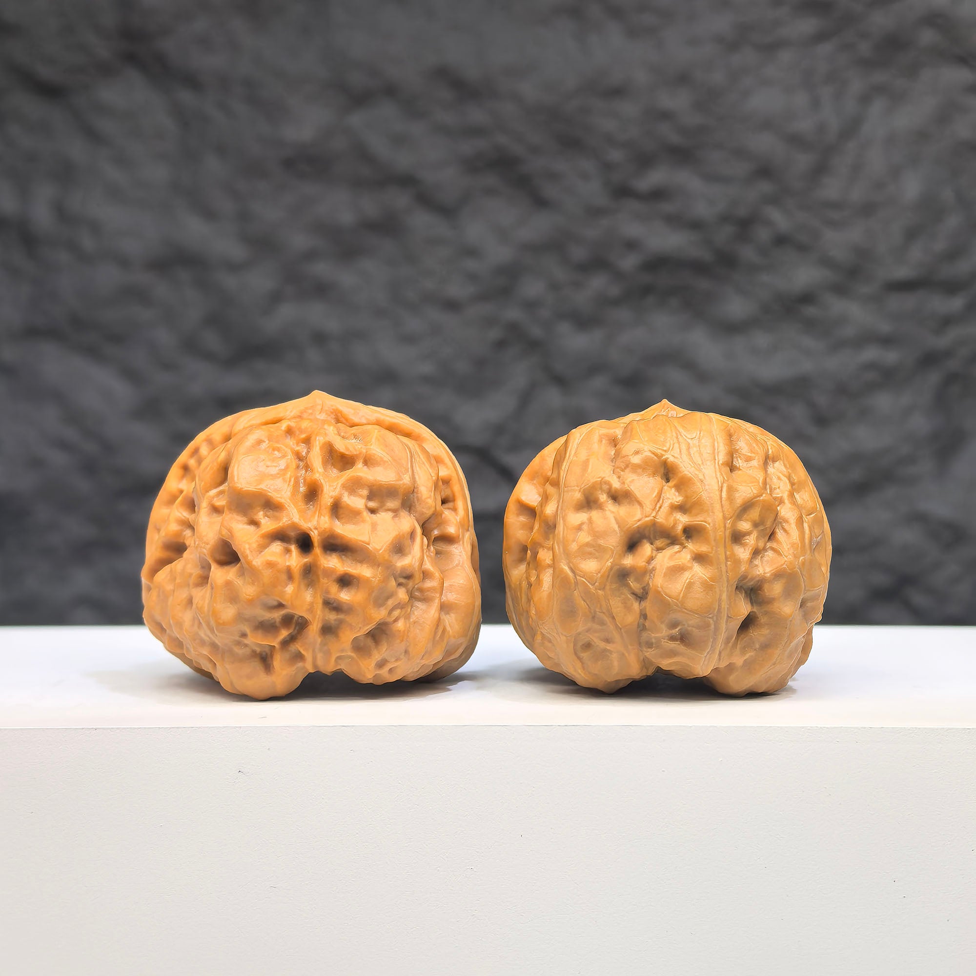 Pair of "Toad Head" Wenwan walnuts from Wenwan Art, featuring classic 37mm x 35mm walnuts with detailed toad head carvings.