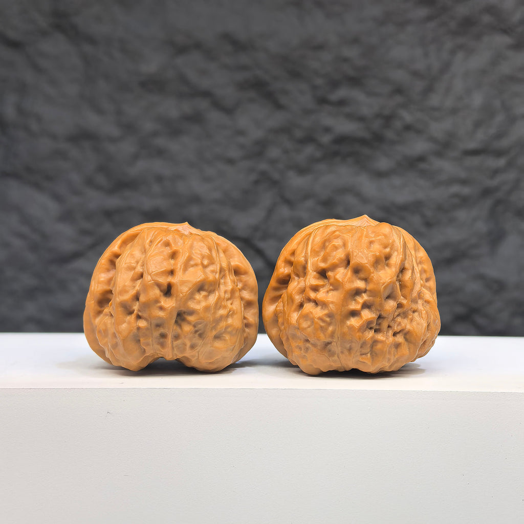Pair of Toad Crystal Frog Wenwan Walnuts from Wenwan Art, featuring detailed carved crystal frog figures, 36mm x 39mm.