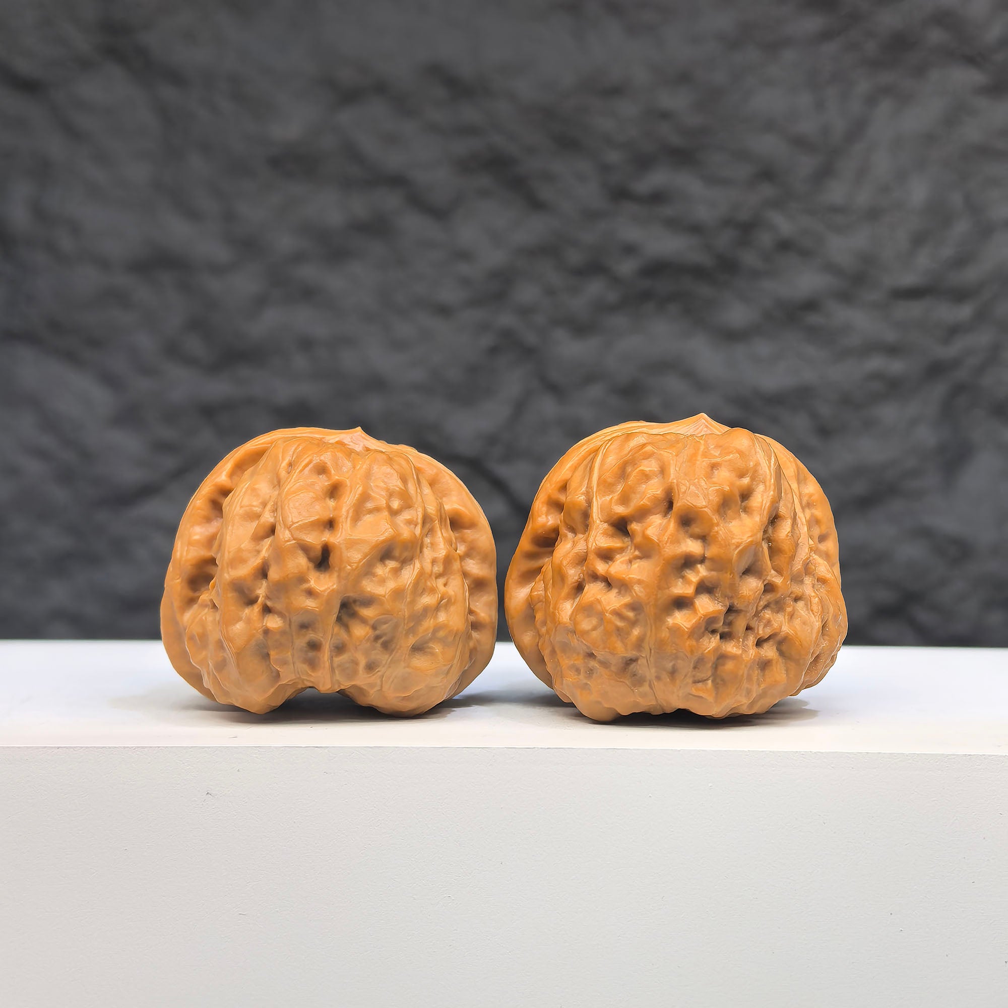 Pair of Toad Crystal Frog Wenwan Walnuts from Wenwan Art, featuring detailed carved crystal frog figures, 36mm x 39mm.