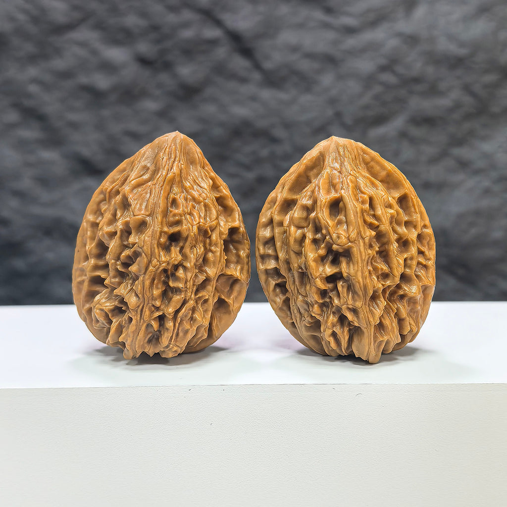 Pair of Beijing Chicken Heart Wenwan walnuts from Wenwan Art, featuring 39mm size with smooth, polished surface.