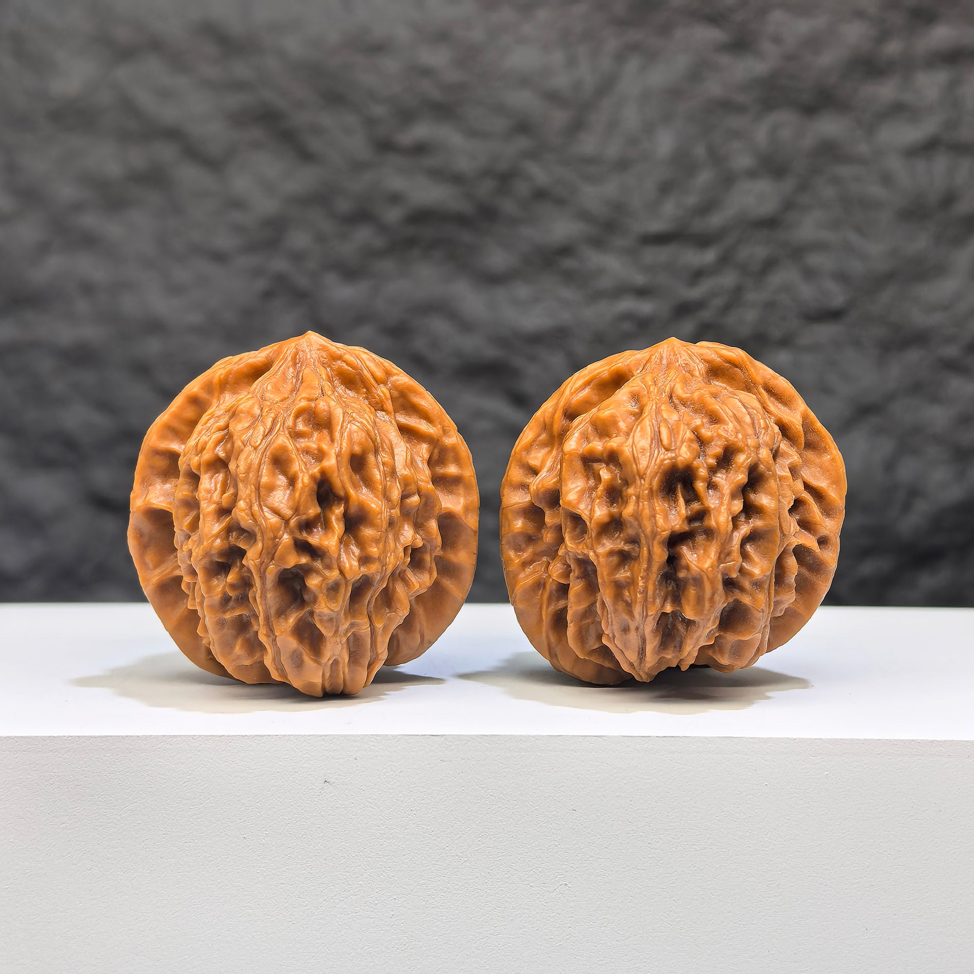 Pair of Dragon Scale Wenwan Walnuts by Wenwan Art, featuring intricate dragon scale patterns, 36mm size, collectible natural walnuts.