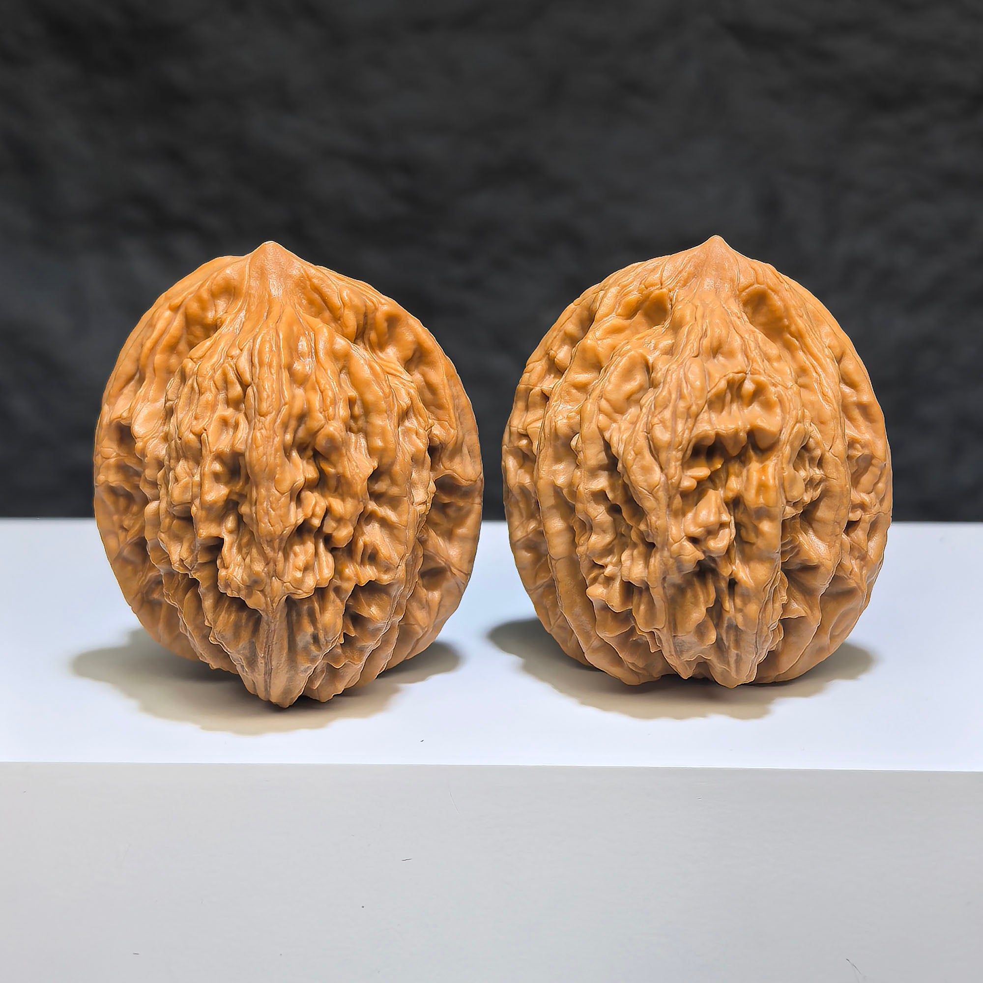 Pair of Wheat Ear Tiger Head Wenwan walnuts from Wenwan Art, 38mm x 36mm, showcasing detailed tiger head carvings.