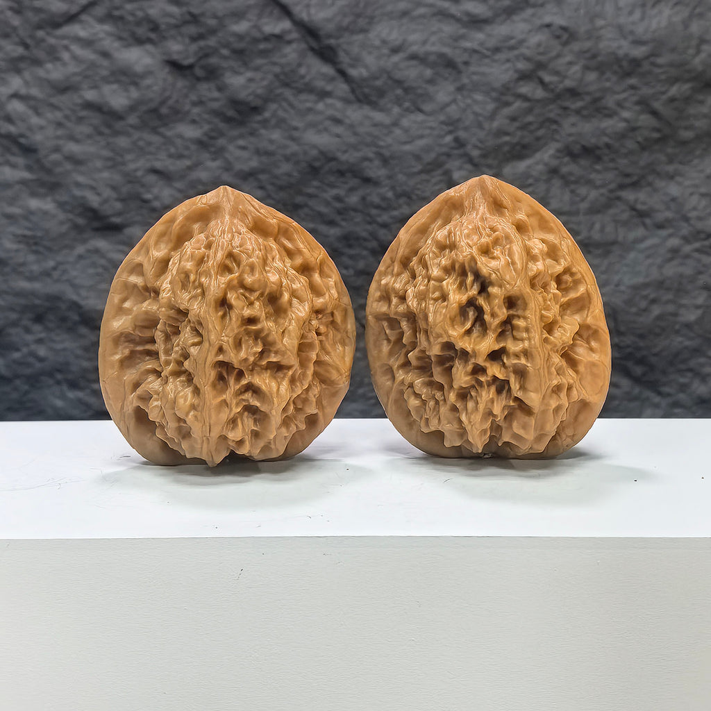 Pair of Arhat Head Wenwan walnuts by Wenwan Art, round profile, 41mm x 38mm, showing detailed natural walnut texture and craftsmanship.