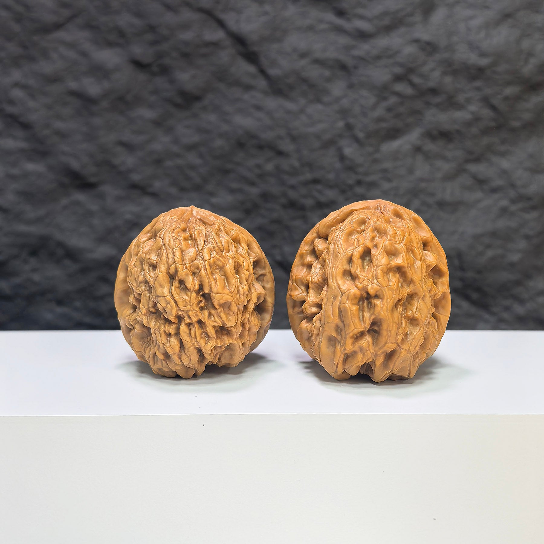 Pair of Wenwan Art Rolling Donkey Wenwan walnuts, 40mm, with textured surface and natural wood grain, traditional Chinese craftsmanship